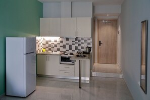 Habitación Deluxe | Cortinas blackout, insonorización y tabla de planchar con plancha