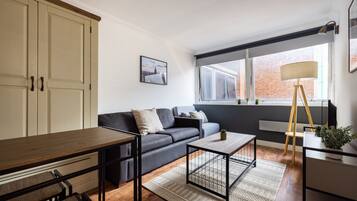 Apartment | Living area | 37-inch TV with cable channels, Netflix, streaming services