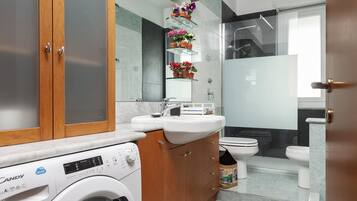 Hair dryer, bidet, towels, soap