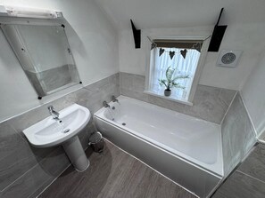 Shower, towels, toilet paper