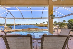 A heated pool - Amazing sunsets, Fishing from the dock, Large lanai & Pool -  Villa Boa Vista - Roelens Vacations (Cape Coral)