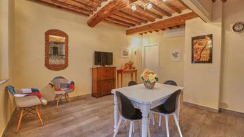Superior Apartment | Living area | 30-inch flat-screen TV with digital channels, TV