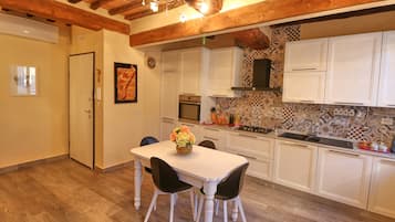 Superior Apartment | Private kitchen | Full-size fridge, microwave, oven, stovetop