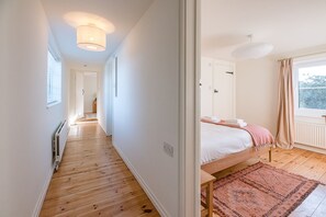 4 bedrooms, laptop workspace, iron/ironing board, bed sheets