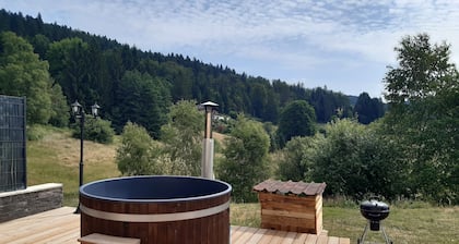 Triplex dans ferme rénovée avec bain nordique privatif