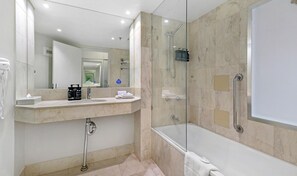 Hair dryer, towels, shampoo, toilet paper