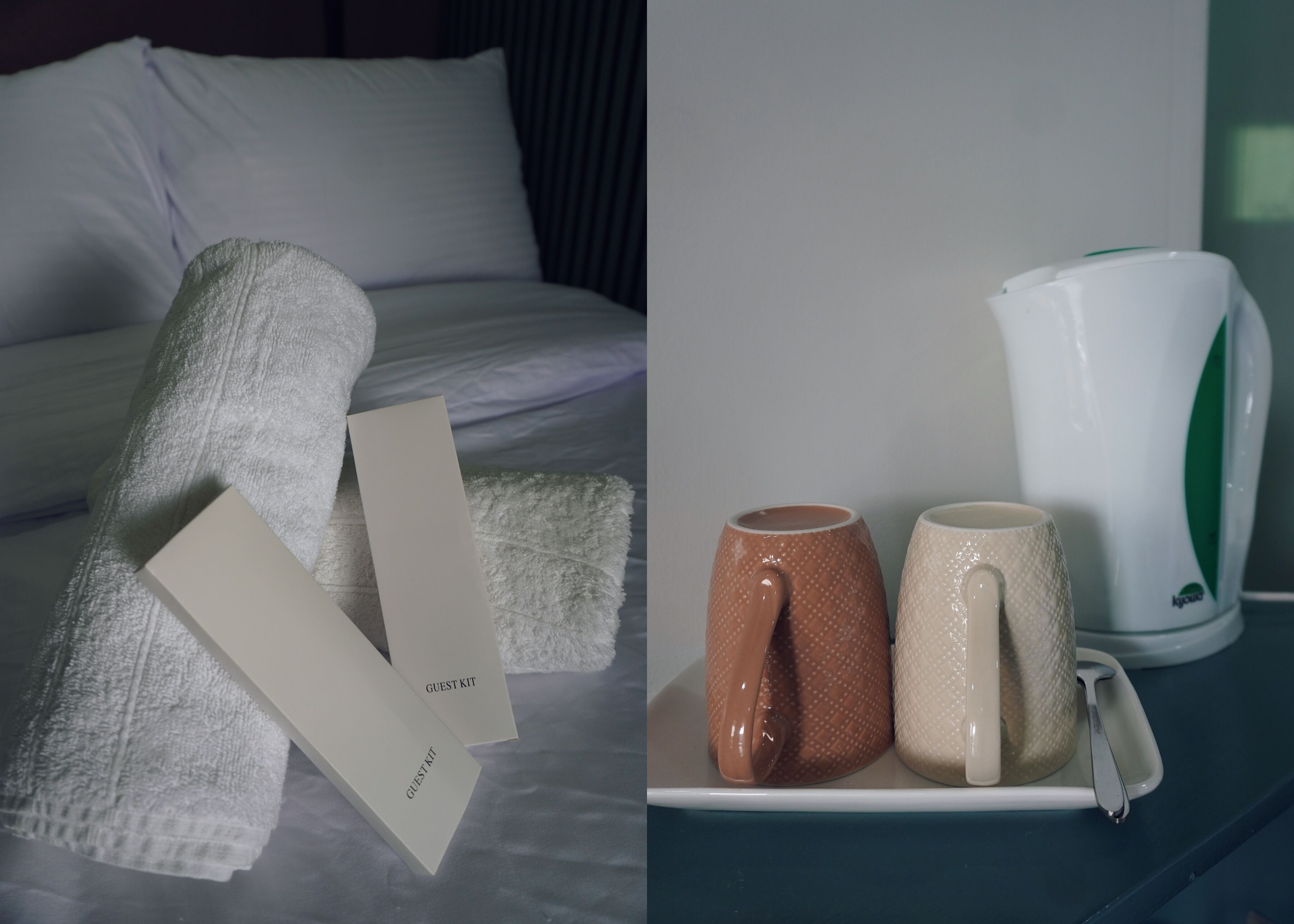 A neatly made bed with white linens and a guest kit beside it.