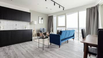 Apartment | Wohnbereich | 37-Zoll-Fernseher mit Kabelempfang, Netflix, Streaming-Dienste