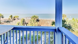 A balcony with a view of the beach and ocean. - Beach Racquet A221 | Water Views, Steps to Beach (Tybee Island)