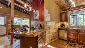 Cabin, 1 Bedroom | Private kitchen | Fridge, oven, coffee/tea maker, toaster