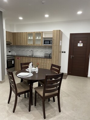 Standard Apartment | Private kitchen | Electric kettle, dining tables - B Holiday Apartments  (Mahé Island)