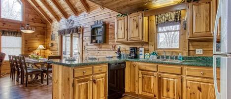 Cabin, 6 Bedrooms | Private kitchen | Fridge, oven, coffee/tea maker, toaster