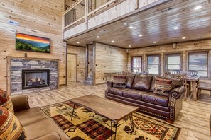 Cabin, 6 Bedrooms | Living area - Ern840 - Splashin' Chalet - Brand New Cabin With Indoor Pool! Great Location! 6 Bedroom Cabin by RedAwning (Pigeon Forge)