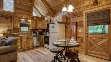 Cabin, 1 Bedroom | Private kitchen | Fridge, oven, coffee/tea maker, toaster