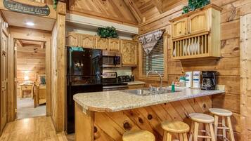 Cabin, 2 Bedrooms | Private kitchen | Fridge, oven, coffee/tea maker, toaster