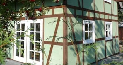 Vacation home Vogelbeere -Idyllic vacation home with half-timbered house between Fleesensee and Golf