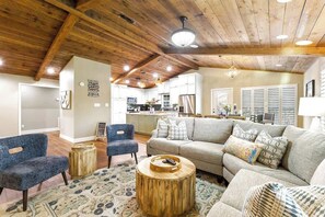 Smart TV, fireplace, table football, books