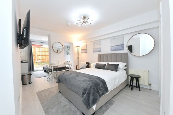 1 bedroom, desk, iron/ironing board, travel cot