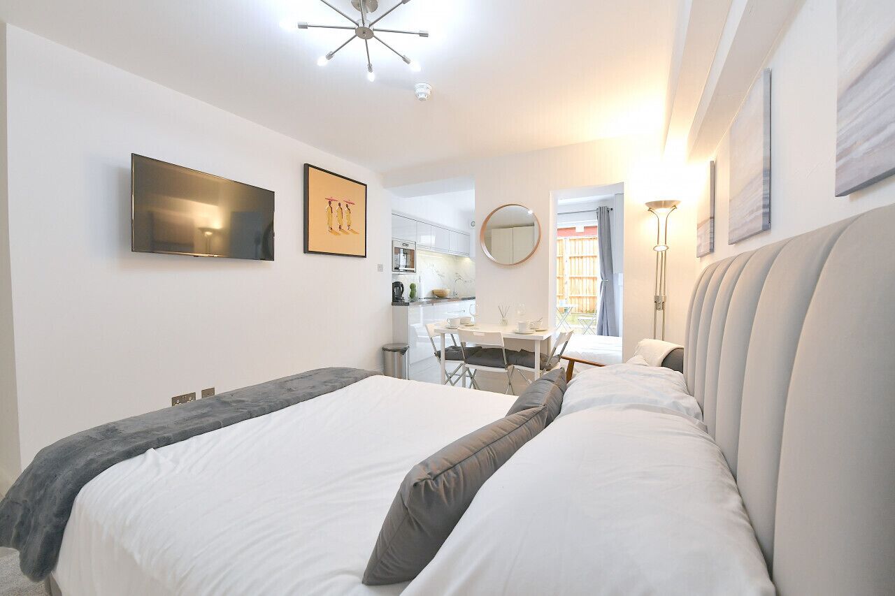 1 bedroom, desk, iron/ironing board, travel cot