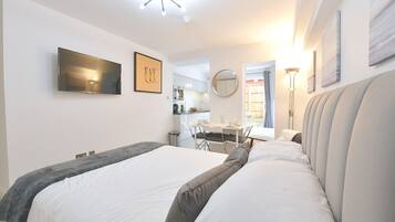 1 bedroom, desk, iron/ironing board, travel cot