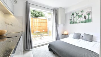 1 bedroom, desk, iron/ironing board, travel cot