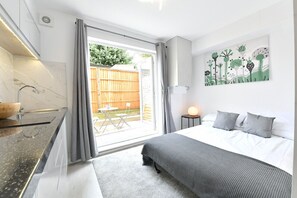 1 bedroom, desk, iron/ironing board, travel cot