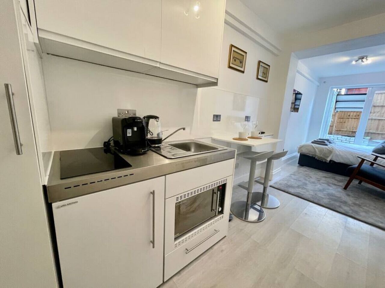 Fridge, microwave, stovetop, coffee/tea maker