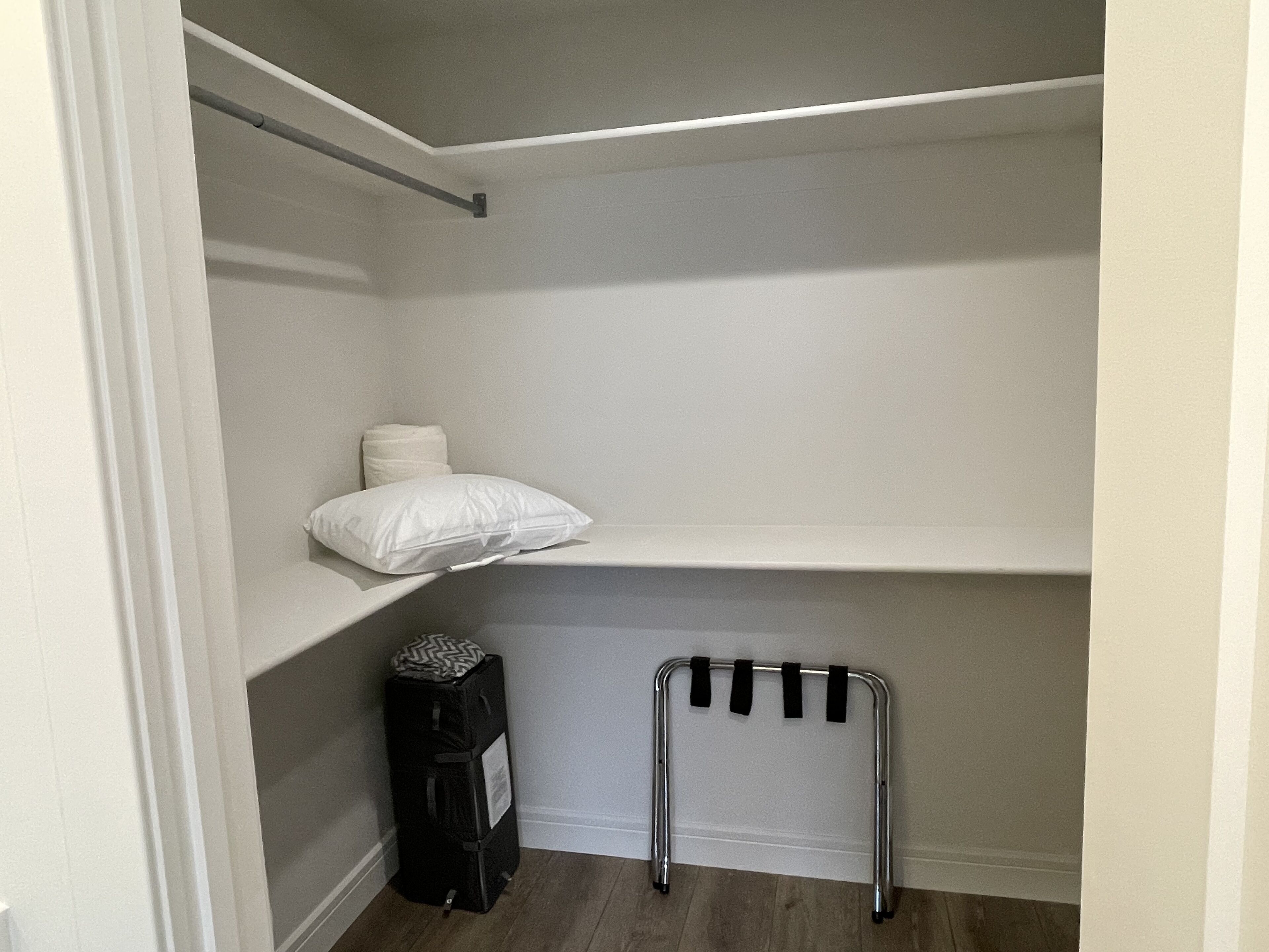 Walk in master closet, ironing board, pack n play