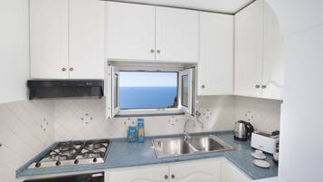 Ferienhaus, 2 Schlafzimmer, Raucher, Terrasse | Eigene Küche | Großer Kühlschrank, Mikrowelle, Herdplatte, Geschirrspüler