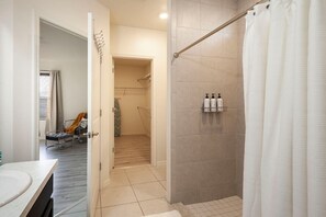 Bathtub, hair dryer, towels, soap