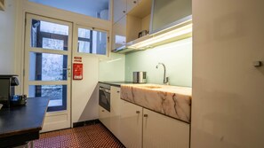 Fridge, stovetop, cookware/dishes/utensils