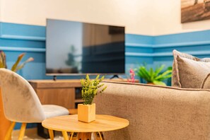 Apartment, 2 Bedrooms | Living area | 50-inch Smart TV with digital channels, TV