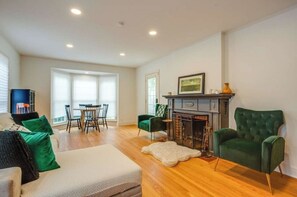 Smart TV, fireplace, books