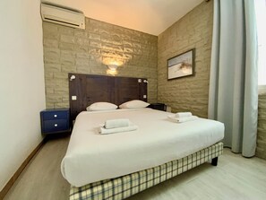 1 chambre, fer et planche à repasser, lit parapluie, Wi-Fi