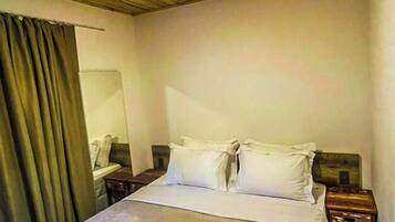 Quarto conforto | 3 quartos, roupas de cama premium