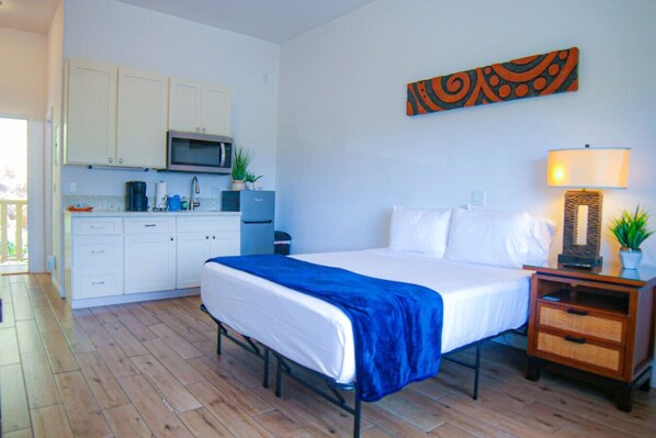 1 bedroom, desk, iron/ironing board, travel cot