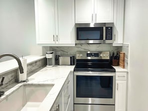 Fridge, microwave, oven, stovetop - NEW LISTING: 1Bedroom Luxury Large Spacious Modern Condo close to Grace Bay (Leeward Settlement)