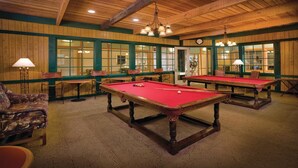 A pool hall with two pool tables, chairs, and tables. - 2BD/Williamsburg at Governor's Green - Lots to do! (Williamsburg)