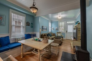 Flat-screen TV, fireplace, video-game console, DVD player