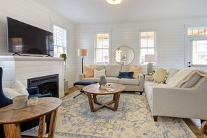 Smart TV, fireplace, DVD player, books