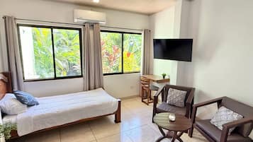 1 bedroom, desk, iron/ironing board, travel crib