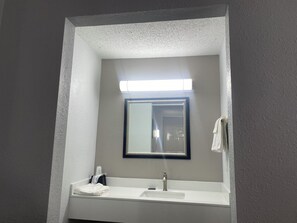 Shower, towels, soap, toilet paper