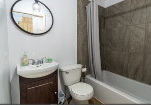 Family Studio, 2 Double Beds (La scintillante) | Bathroom | Hair dryer, towels, soap, shampoo