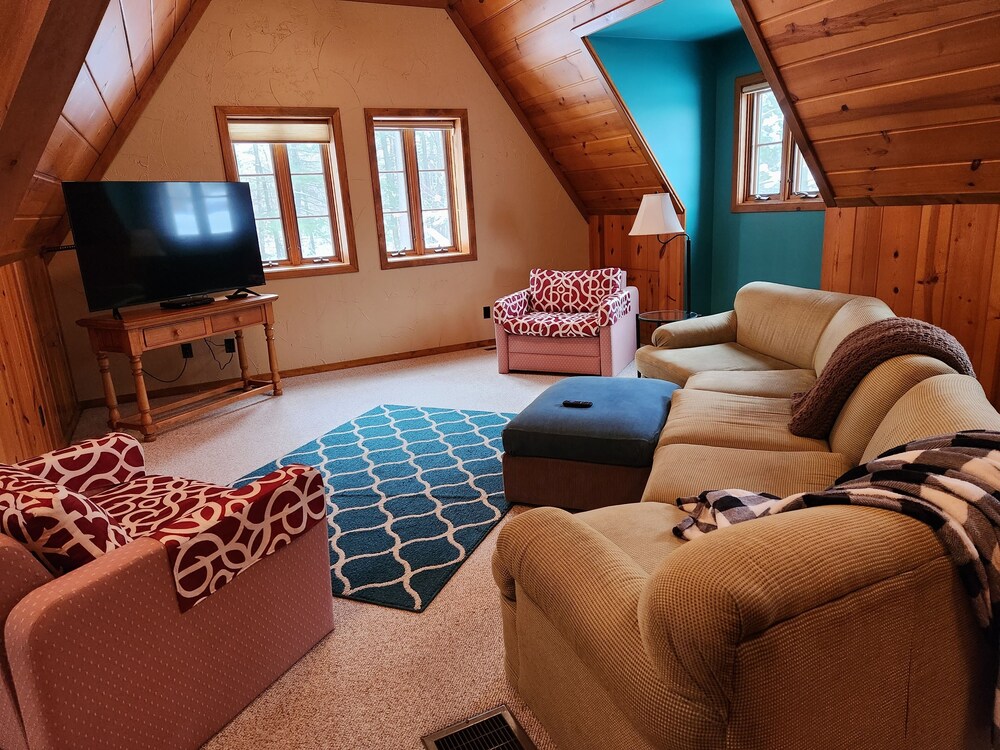 Lakeside estate with 350' of shoreline on Lake Belle Taine Hubbard