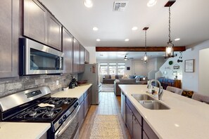 Fridge, microwave, oven, stovetop - Modern home in a great location with mountain views, grill, patio, & work desk (Flagstaff)