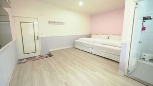 A bedroom with a bed, a door, a small rug, and a wall with a light switch. - Sun Moon Cat (Yuchi)