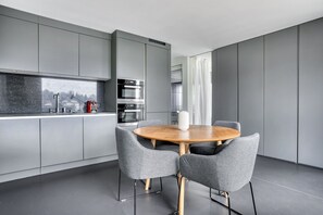 Dining - Lovely Enge 2.5 Room w/ Storage & W/D, in Fifa Museum, by Blueground (Zurich)