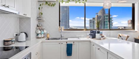 Two-Bedroom Apartment with Ocean View | Private kitchen | Full-size fridge, microwave, oven, stovetop