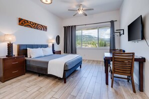 1 bedroom, desk, iron/ironing board, travel crib