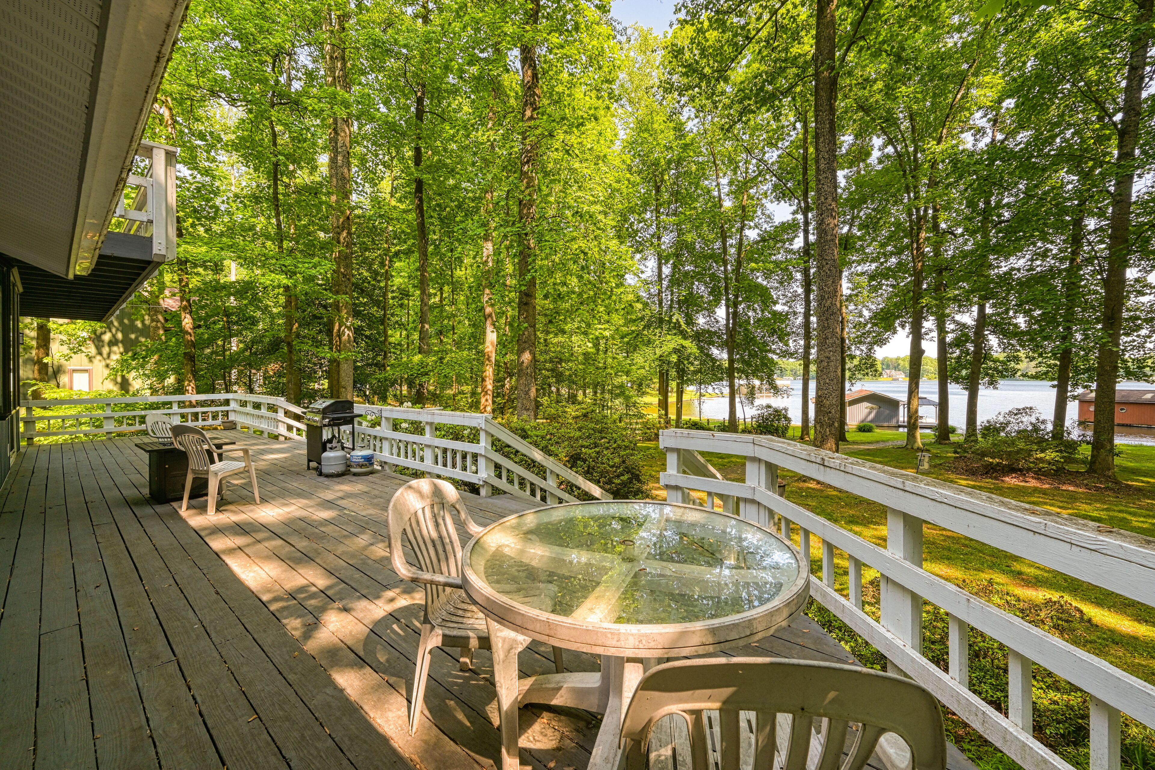 Dog-friendly lakefront home with pool table, grill, lake views, water access, AC